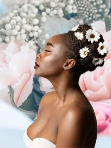 black woman side profile surrounded by flowers